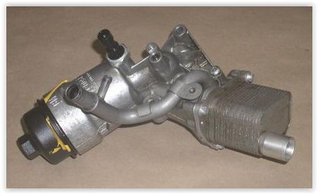 YAĞ SOĞUTUCUSU (KOMPLE) ADAM-ASTRA J-CORSA D-E-INSIGNIA A-MERIVA B-MOKKA-ZAFIRA TOURER-AVEO-CRUZE (A1.4 NET 1.4 NEL) - GM - OEM 55566784